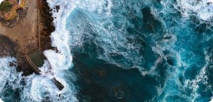 Aerial drone view of rough sea at Argentiera, Sardinia, empty coastal landscape with no people