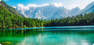Lake of Fusine or Lago Superiore di Fusine in the Mountain Range of Mount Mangart in Julian Alps near Tarvisio in Italy near Slovenia
